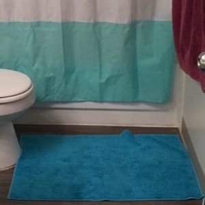 2 blue bath rugs